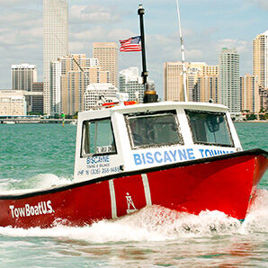 BoatUS tow boat moving through the water.