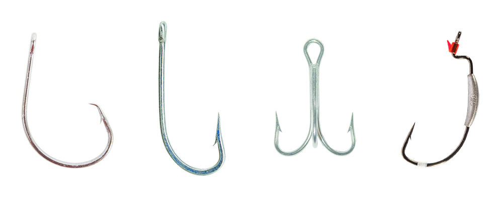 Assortment of fishing hooks including circle hooks, J-hooks, treble hooks, and offset hooks