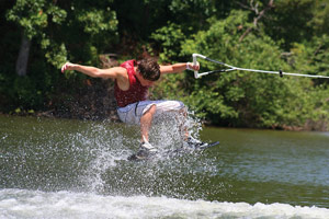 wakeboard jumping off the wake