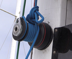 Halyards tied to a winch to avoid it being removed