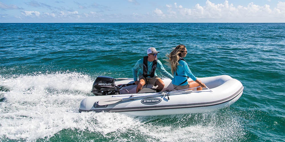 Man and woman in inflatable boat