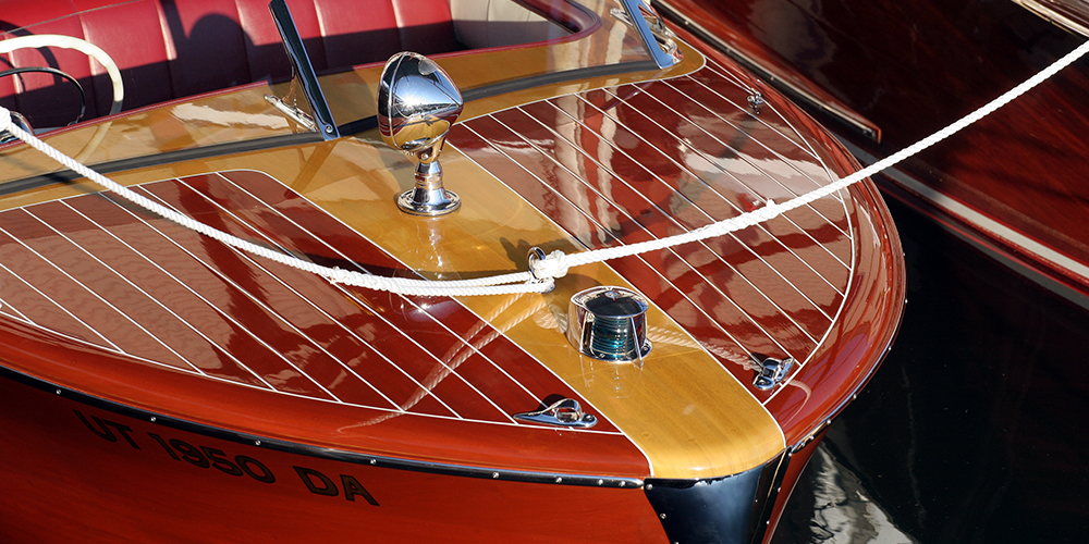 Perfectly varnished foredeck of vintage wood runnabout
