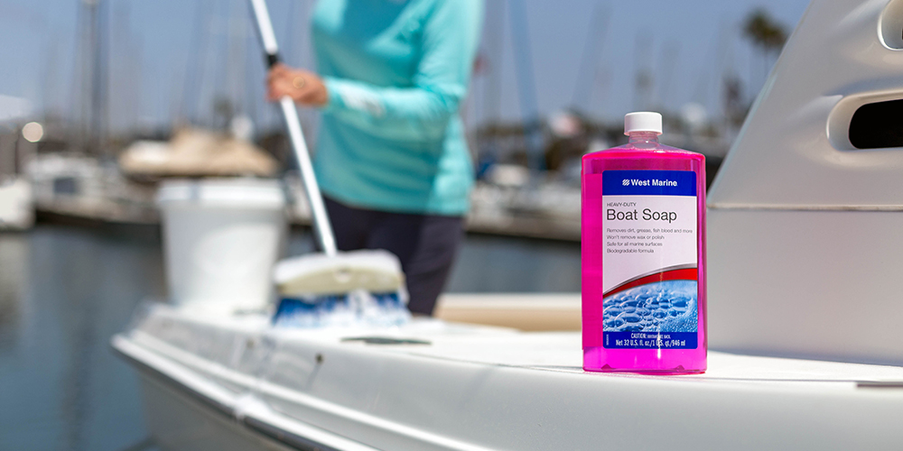 Bottle of West Marine Heavy-Duty Boat Soap on boat deck