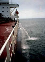 Large ship pumping ballast water