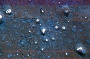 scuffing blisters with a sanding disk to highlight them before they shrink