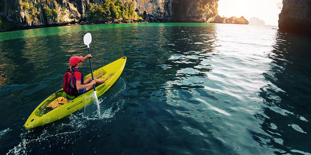 Female paddling kayak