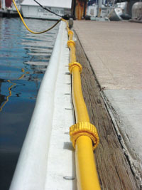 Shore Power Cord secured to dock with straps