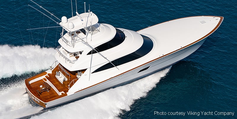 90 foot sportfishing yacht planing across the water