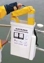 Lifesling being removed from case attached to the stern pulpit of a boat