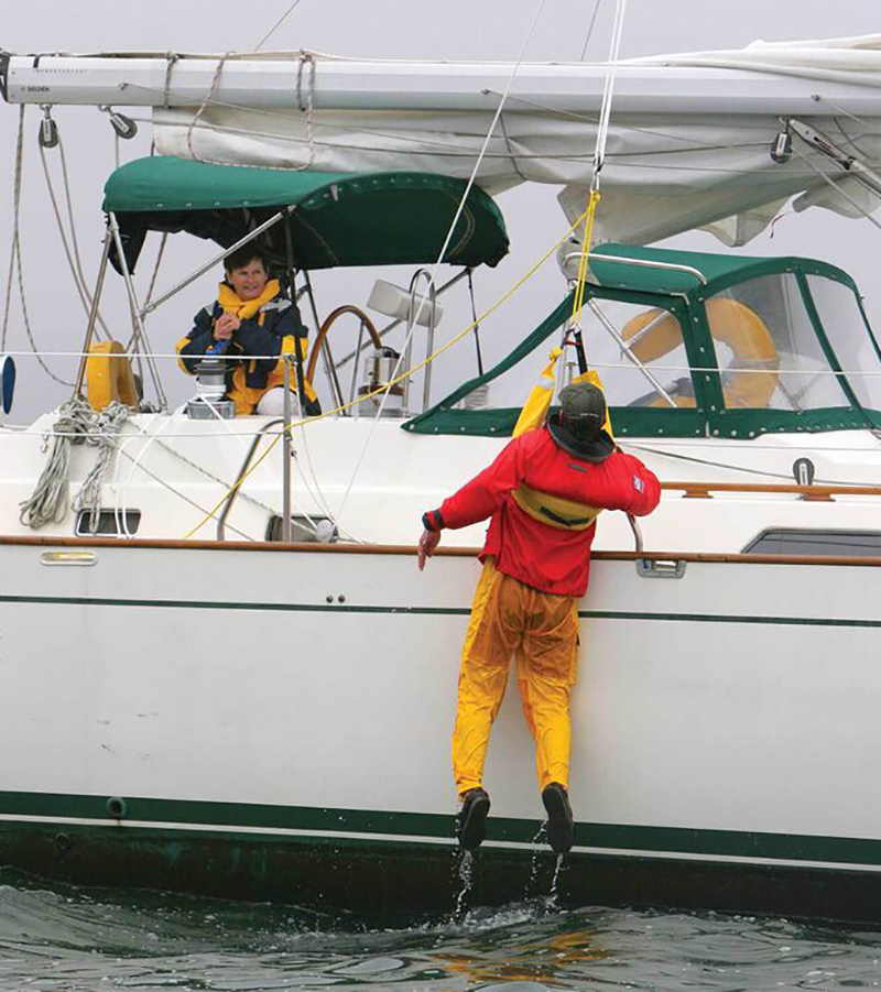 Hoisting overboard crew back onboard sailboat with Lifesling
