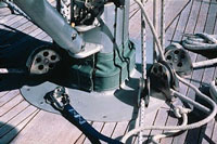Locking carabiner on a padeye at the base of the mast