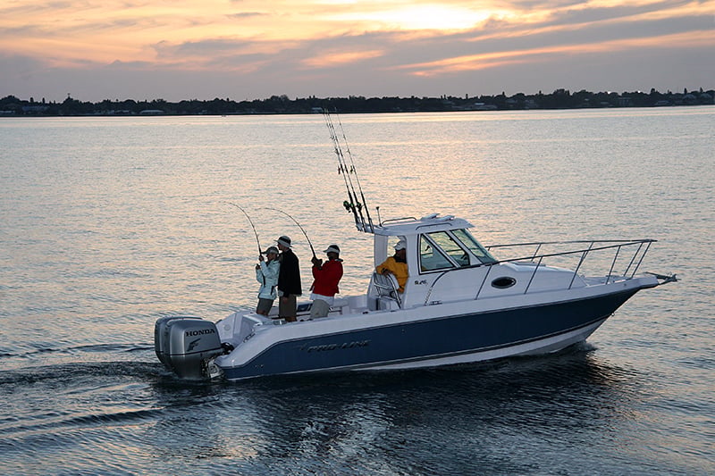 Family on small powerboat with multiple hookups
