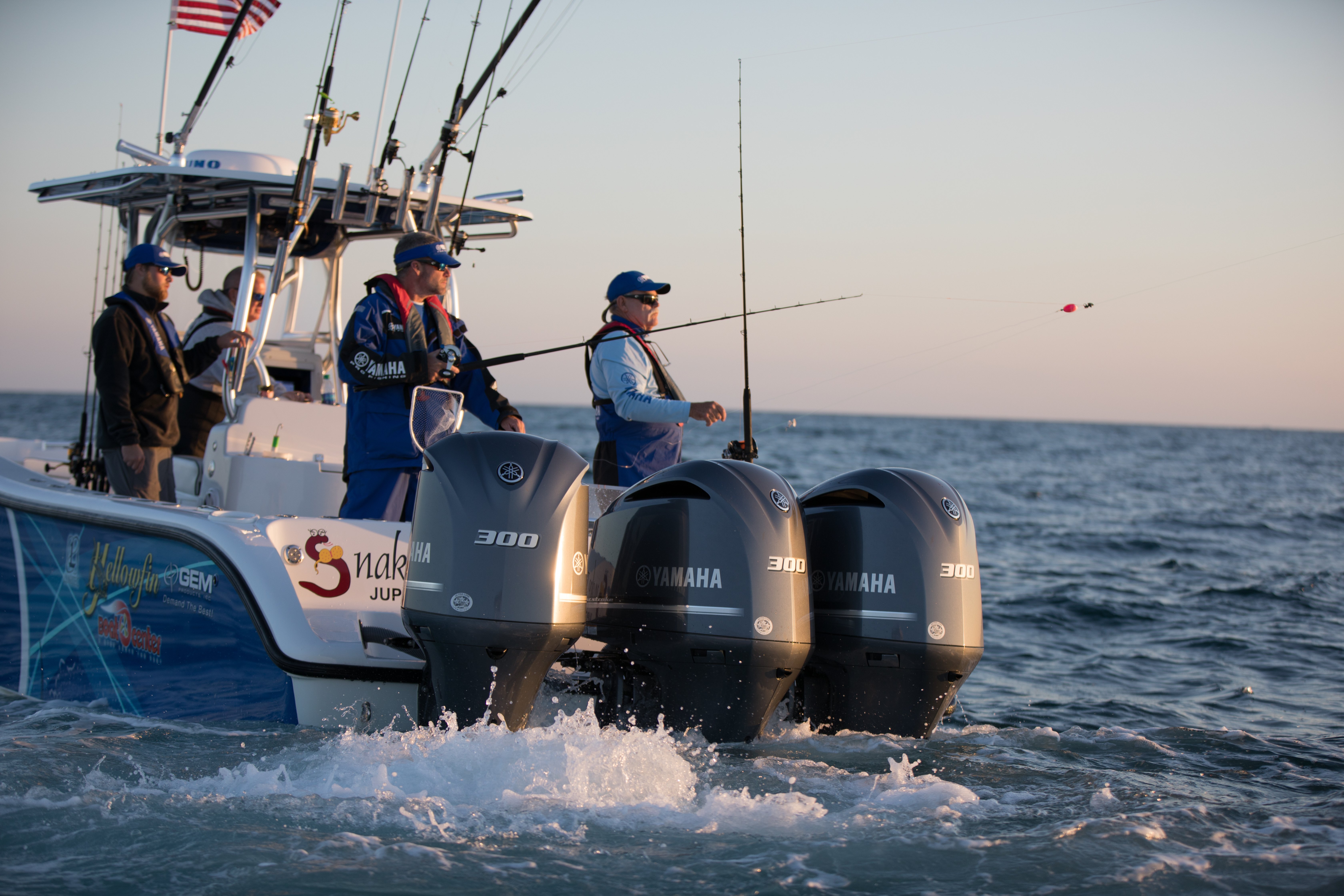 three yamaha 300 horsepower outboard motors on a center console fishing boat